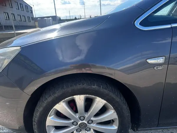 Aripa fata stanga culoare gri - gal z177 Opel Astra J facelift (2012-2015)