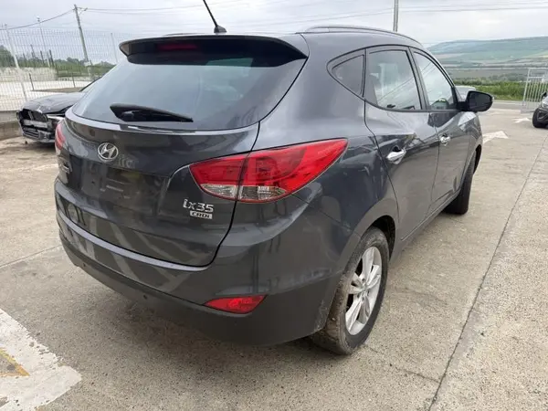 Aripa spate dreapta culoare midnight black Hyundai ix35 facelift (2013-2015)