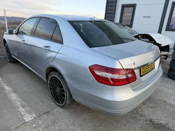 Aripa spate stanga culoare 775 (argintiu iridium - vopsea metalizată) Mercedes E-Class (2009-2016) [W212]