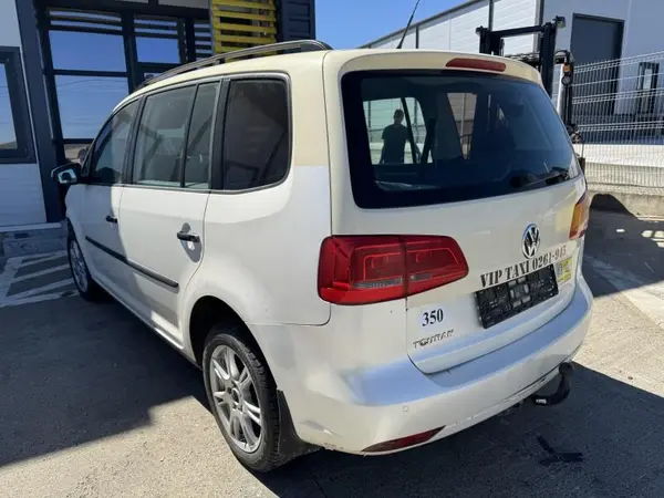 Aripa spate stanga culoare crem Volkswagen Touran facelift (2006-2010)