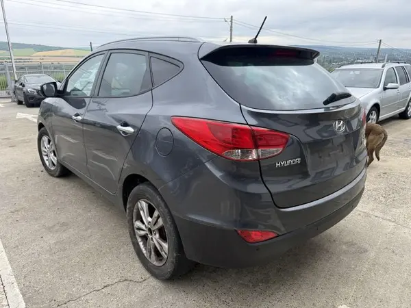 Aripa spate stanga culoare midnight black Hyundai ix35 (2010-2013)