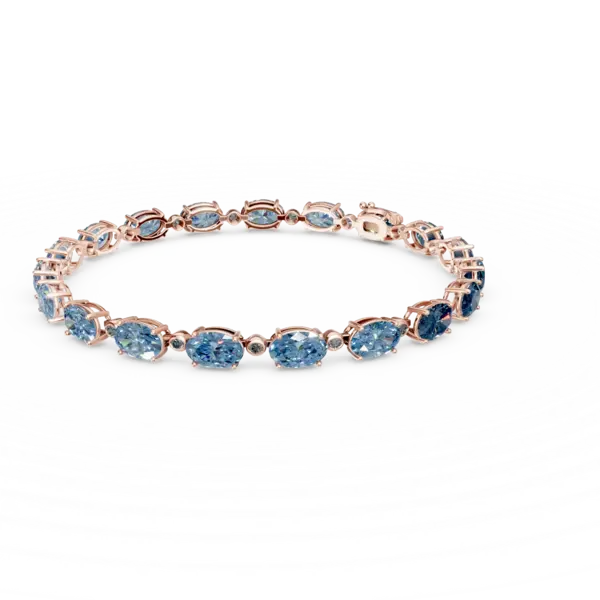 Bratara tennis din aur roz cu topaze albastre ovale de 19.03ct si diamante de 0.4ct