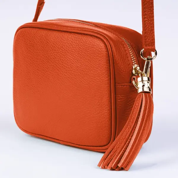 Geanta crossbody portocalie din piele naturala, cu ciucure din piele
