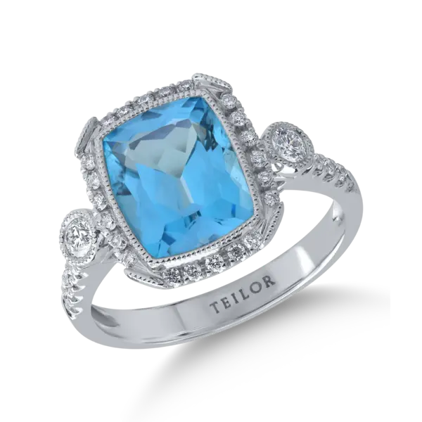 Inel din aur alb cu topaz albastru cushion de 4ct si diamante de 0.3ct