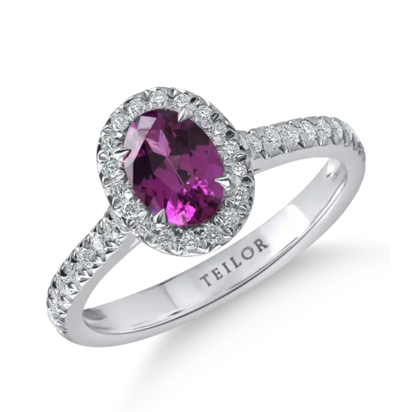 Inel din aur alb cu un granat purple oval de 0.91ct si diamante de 0.31ct