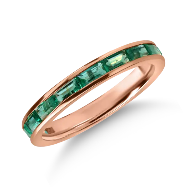Inel semi eternity din aur roz cu smaralde baguette de 0.9ct
