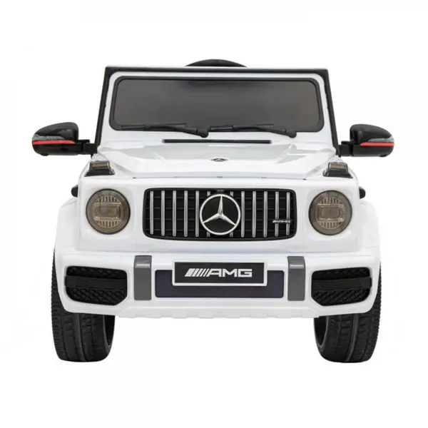 Masinuta electrica pentru copii Novokids Mercedes G63 AMG Alb, roti din cauciuc Eva, melodii si USB, usi cu deschidere, 12V, 2 viteze, lungime 120 cm, 2 motoare de 25 W