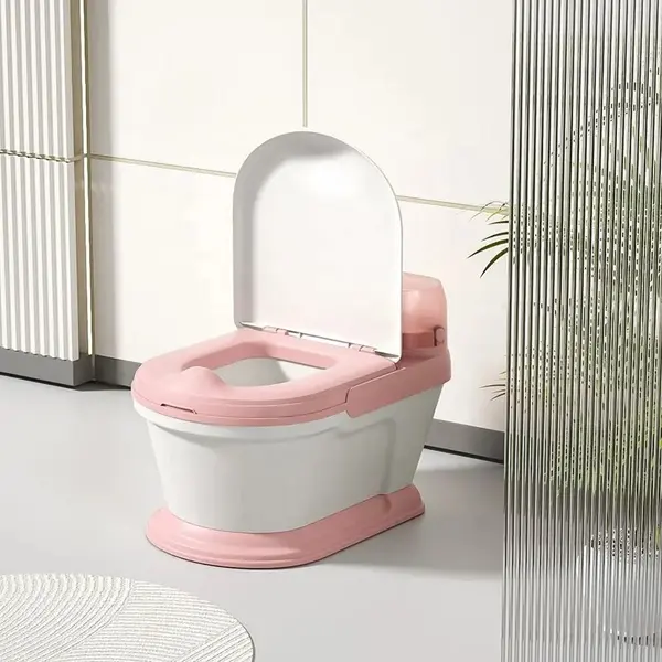Olita pentru copii tip minitoaleta Little Mom Pink, cu adaptor confortabil din PU, design ergonomic, vas colector detasabil, Capac rabatabil si suport pentru servetele, dimensiune 34 x 38 x 28 cm