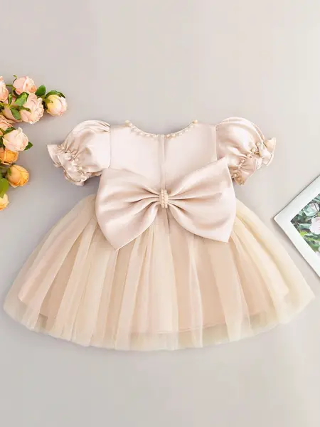 Rochie cu fundita din tiul - sampanie / 18-24 luni (86-92 cm)