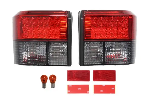 Set stop tripla lampa spate (Semnalizator fumuriu, culoare sticla: rosu) VW TRANSPORTER BUS PLATFORMA SASIU 1995-2003