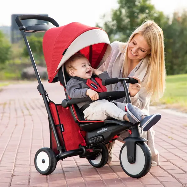 Tricicleta pentru copii Smart Trike STR5 Rosu 7 in 1, ultrapliabila, dotata cu frana, scaun rabatabil, de la 6 luni, sistem patentat cu tehnologie Touch Steering